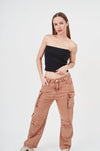 Vibrant Flare Cargo Pants from H Apparel - Stylish woman in black top and cargo pants