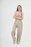 Versatile Beige Cargo Jumpsuit - Effortless Style for All-Day Comfort
A beige cargo jumpsuit with a strapless design, showcasing a relaxed yet stylish look.