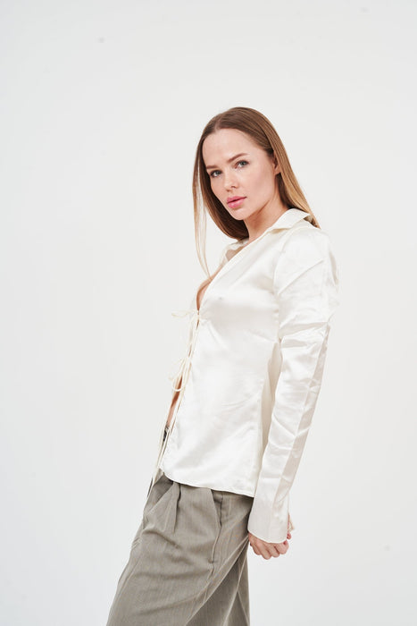 Elegant Long-Sleeve Satin Blouse by H Apparel: Classic white satin top with feminine silhouette and tailored design, perfect for modern, versatile style.