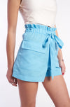 Stylish high-waisted denim shorts with a fashionable bow tie detail, showcased against a plain background.