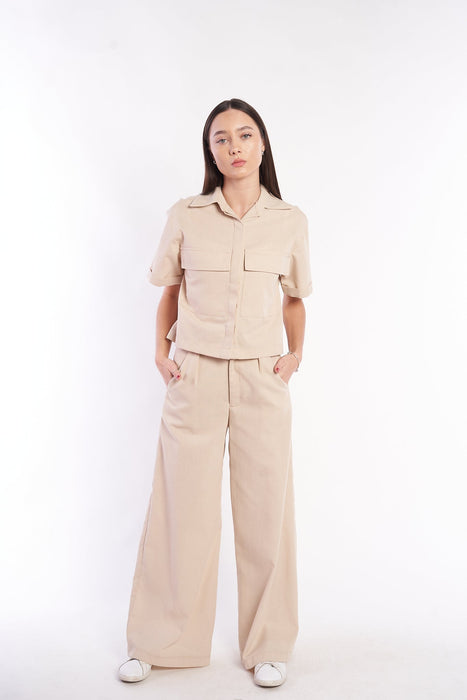 Beige linen-blend wide-leg pants and matching utility jacket from H Apparel brand, featured on a female model against a plain white background.