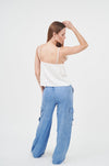 Flattering Wide-Leg Denim Jeans from H Apparel: Classic blue cargo pants paired with a stylish white camisole top.