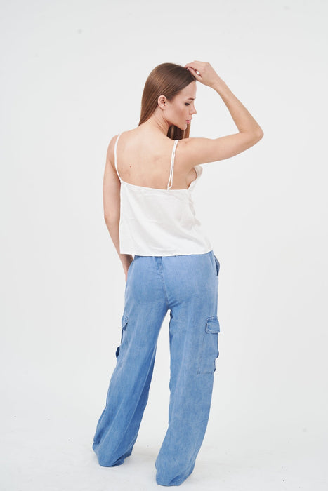 Flattering Wide-Leg Denim Jeans from H Apparel: Classic blue cargo pants paired with a stylish white camisole top.