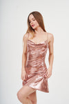 Shimmering champagne slip dress with graceful female model