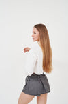 Stylish mini skirt with built-in shorts by H Apparel: elegant fashion statement with practical design.