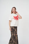 Vibrant graphic white t-shirt with New York text for modern women