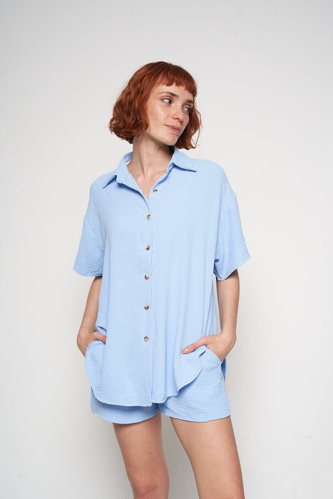 Casual chambray button-down shirtdress by H Apparel, featuring a relaxed fit and short sleeve design for comfortable everyday wear.