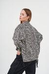 Stylish Leopard Print Faux Fur Open-Front Jacket - Fashionable outerwear with bold animal print design, ideal for adding a touch of chic to any outfit.