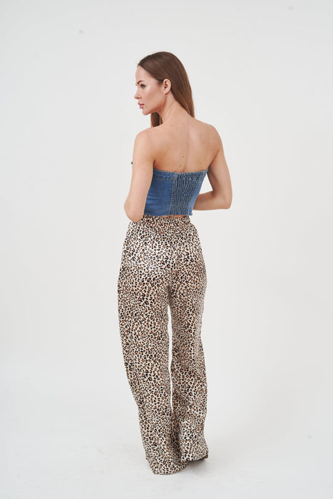 Chic cheetah print palazzo pants by H Apparel - bold and stylish bottoms for the modern fashionista